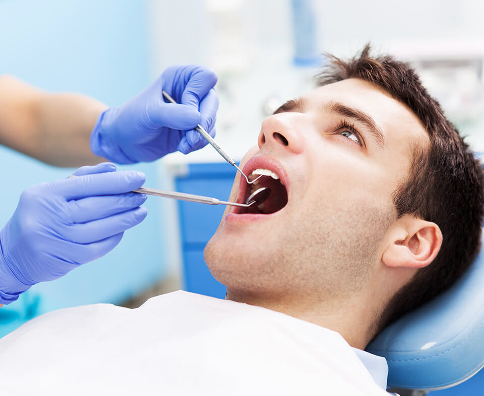 man receiving dental work