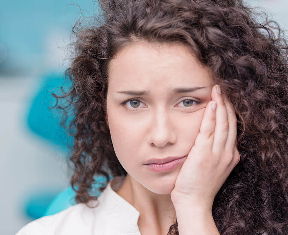 woman with mouth pain