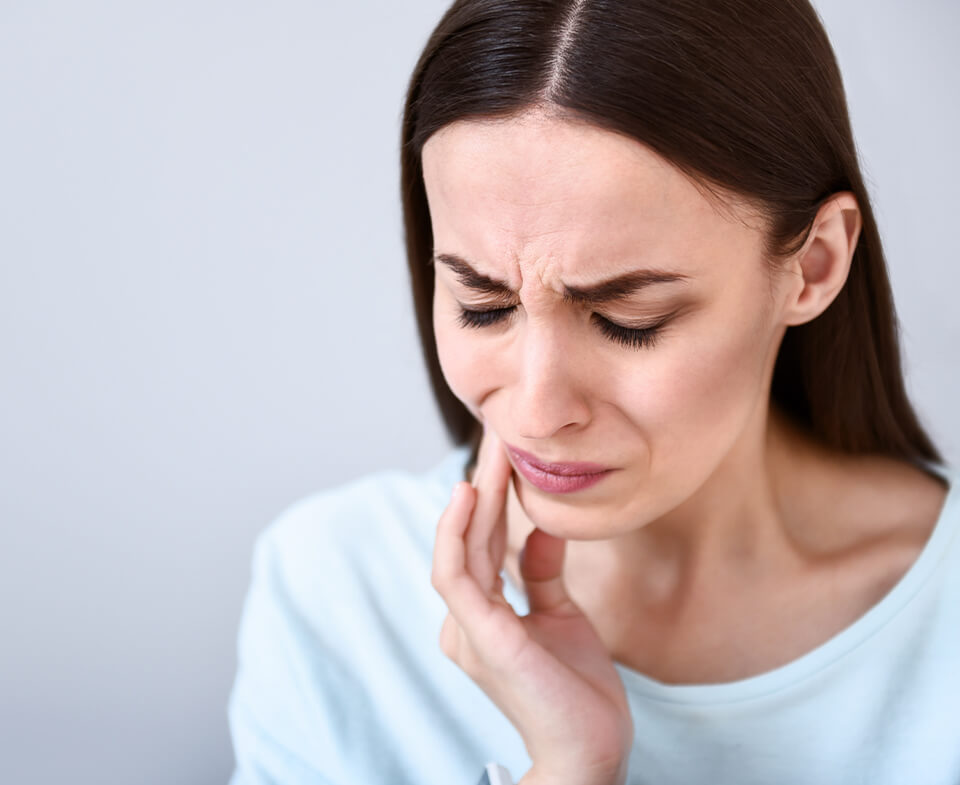 woman with mouth pain