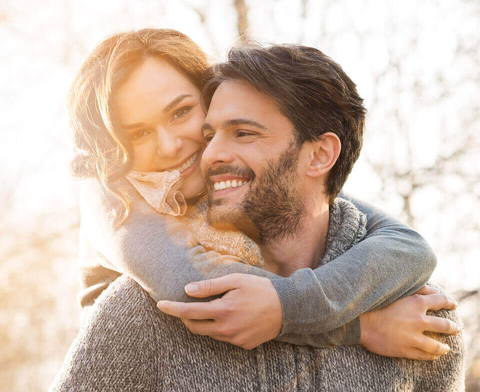 couple hugging and smiling