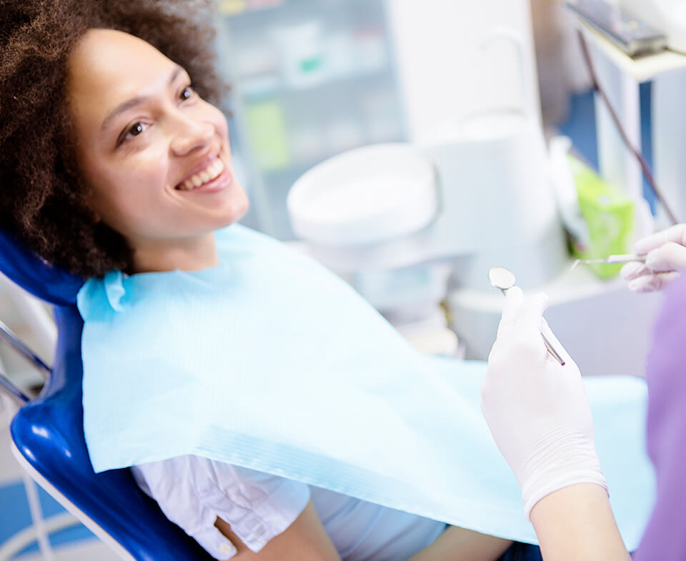 woman sitting in a dental chair