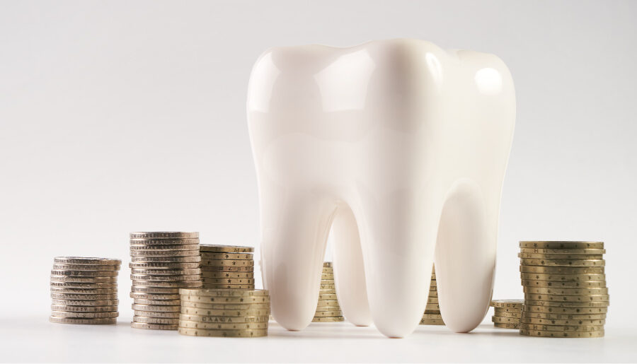 A tooth next to piles of coins in Bellevue