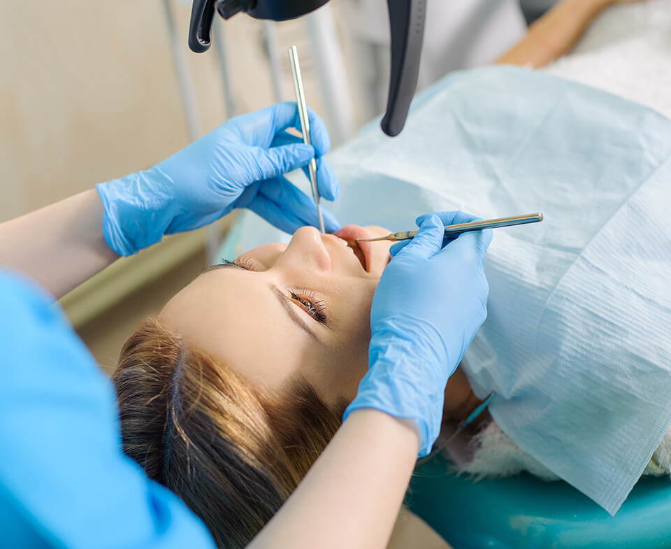 dentist working with a patient