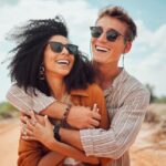 smiling couple summer smiles cosmetic dentistry