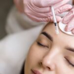 woman getting botox or facial dermal fillers for facial rejuvenation