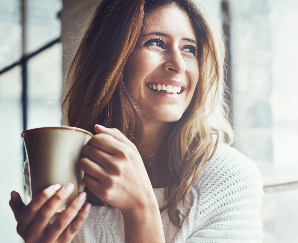 happy woman drinking coffee